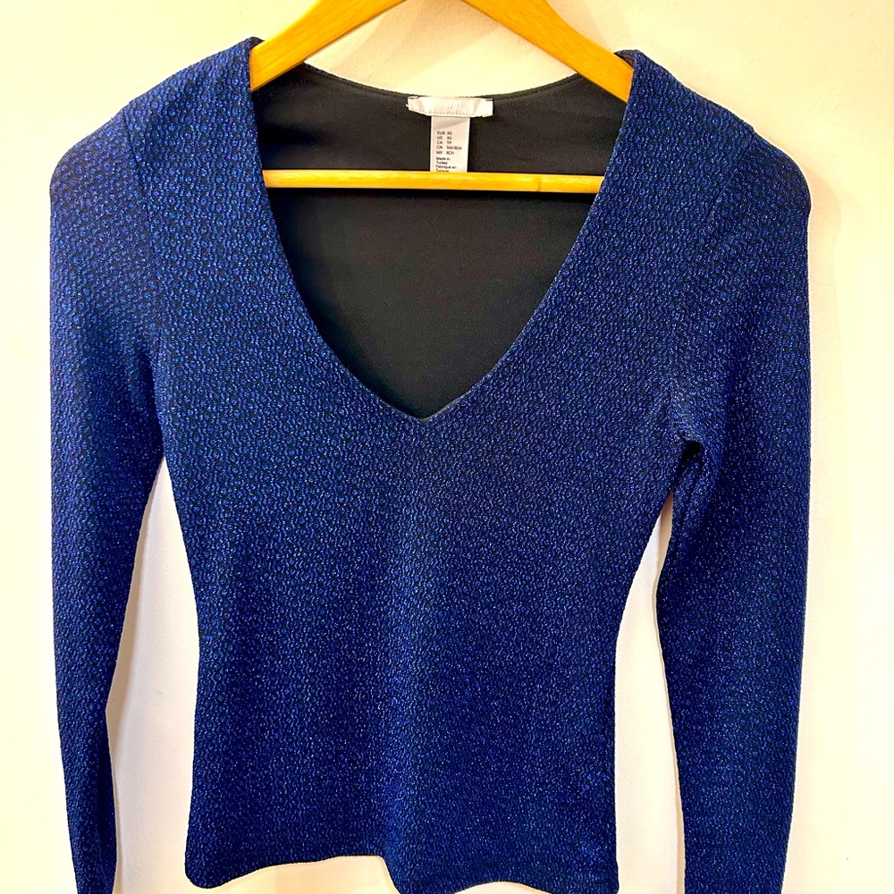 Sexy V neck light sweater size small.